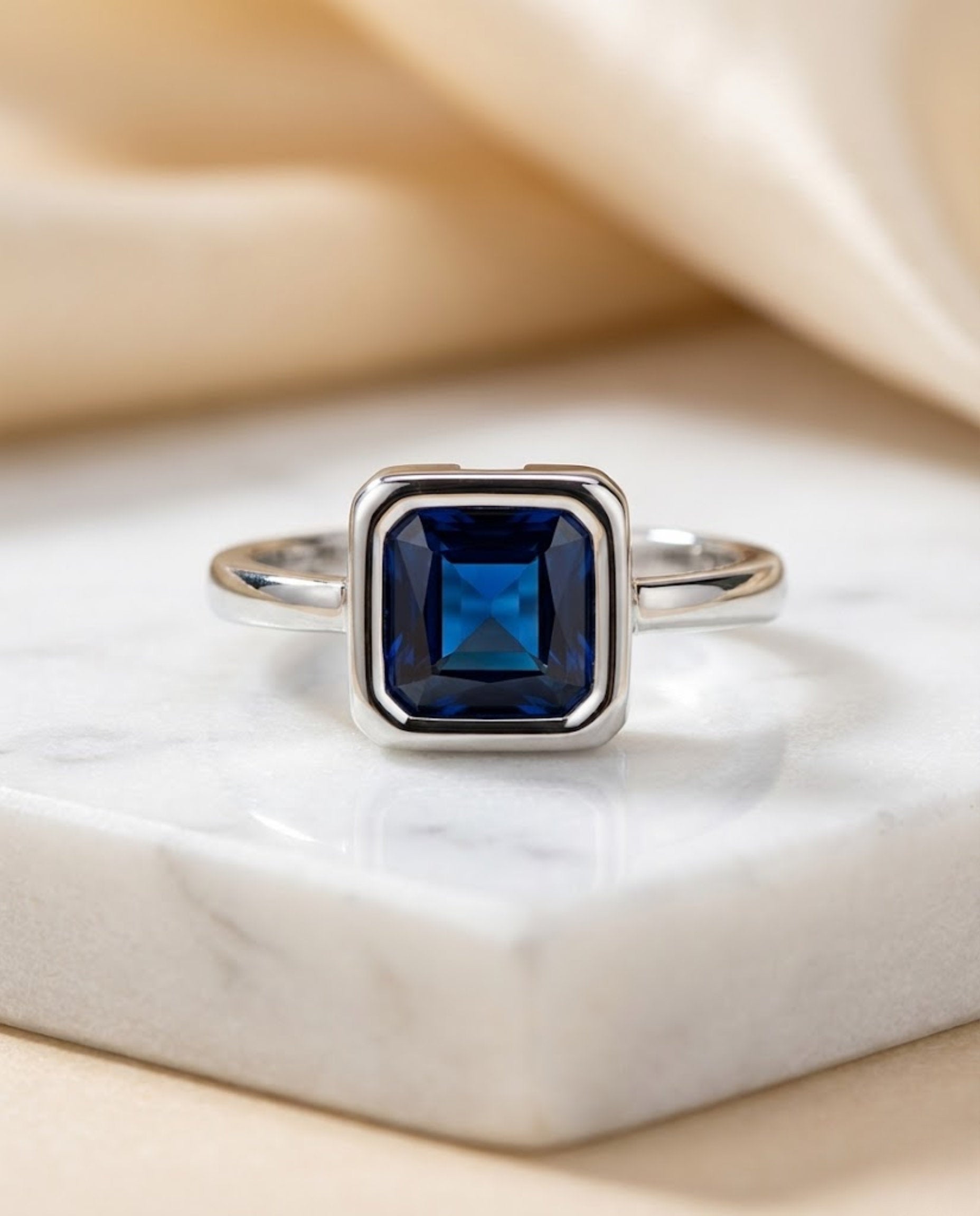 Orneza Royal Blue Sapphire Square Solitaire Silver Ring
