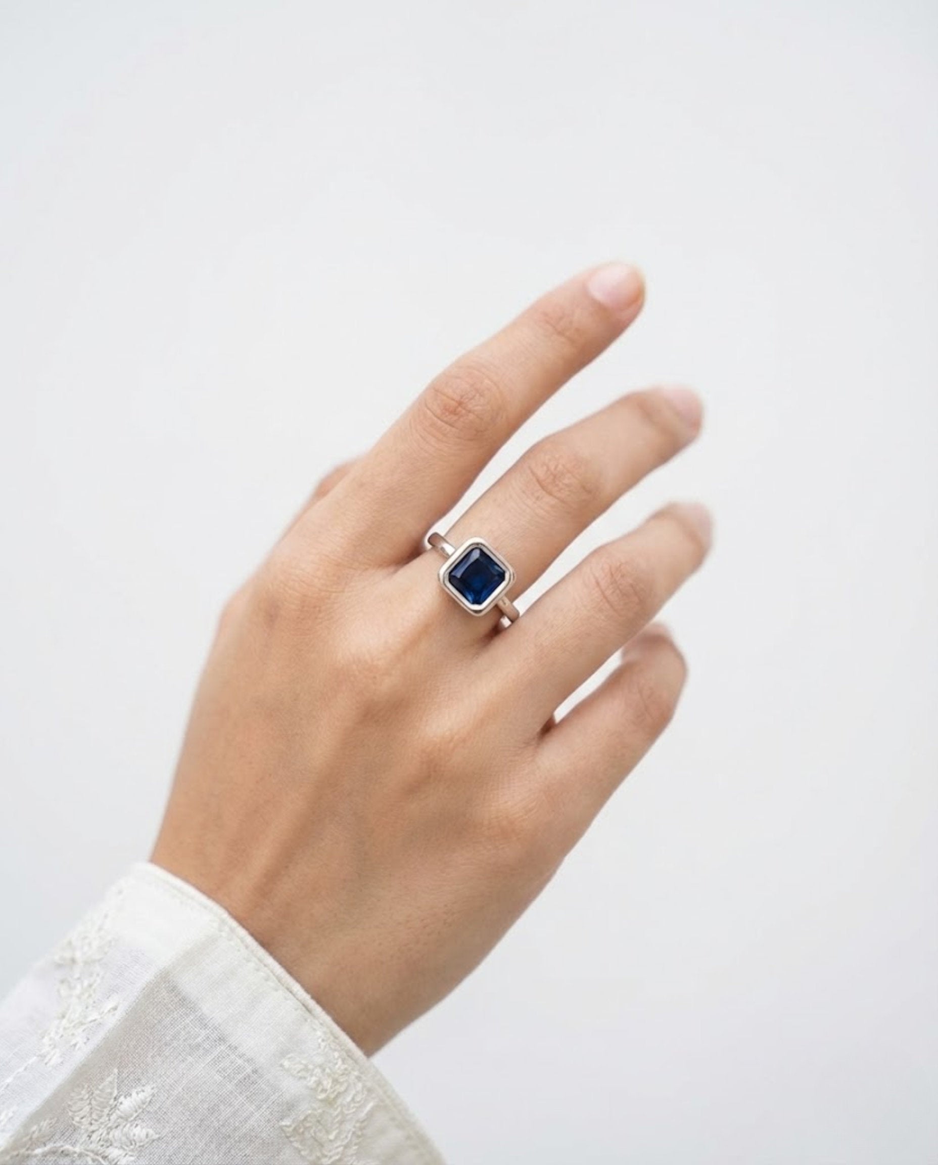 Orneza Royal Blue Sapphire Square Solitaire Silver Ring