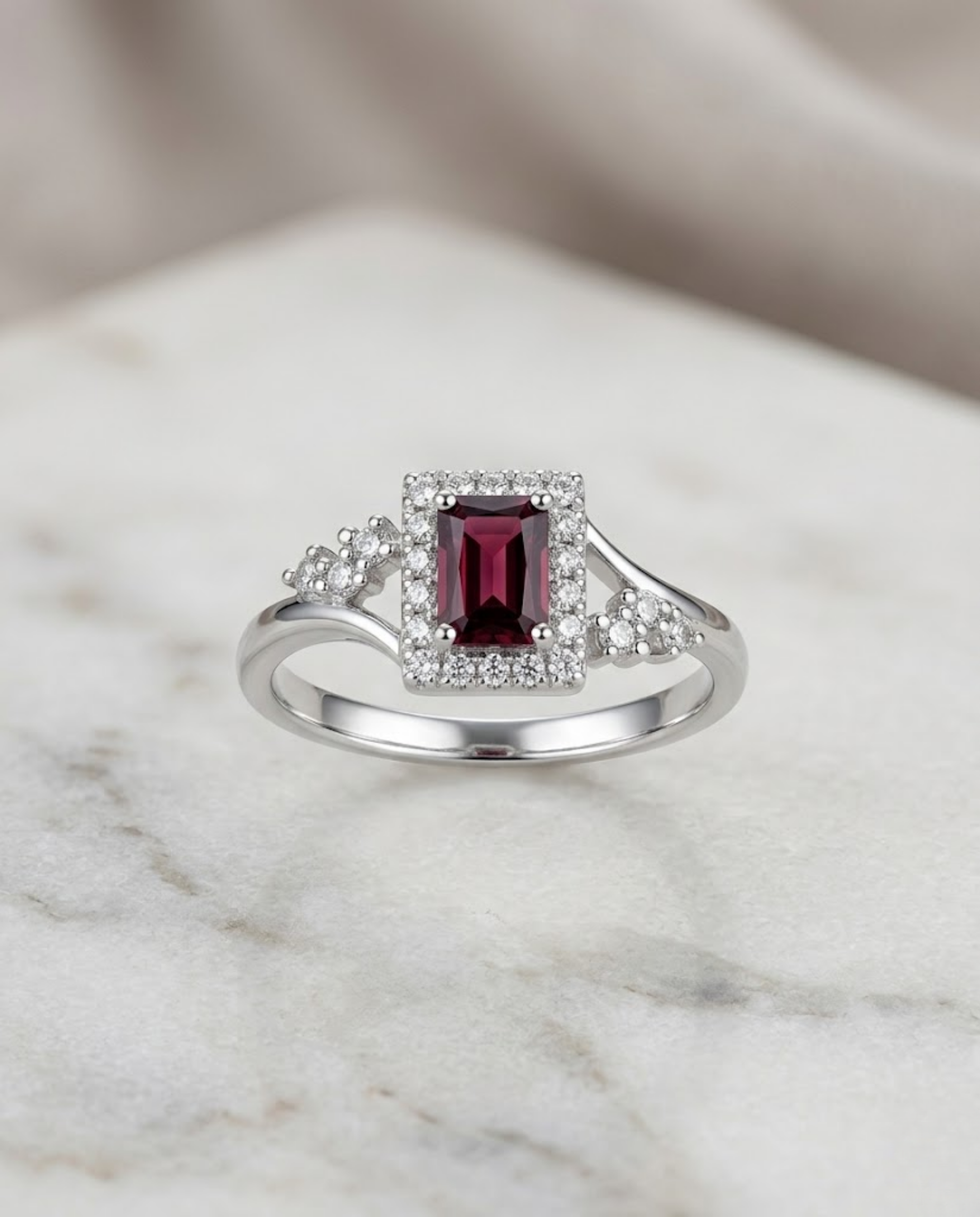 Orneza Emerald Cut Rhodolite Garnet Halo Ring in Silver