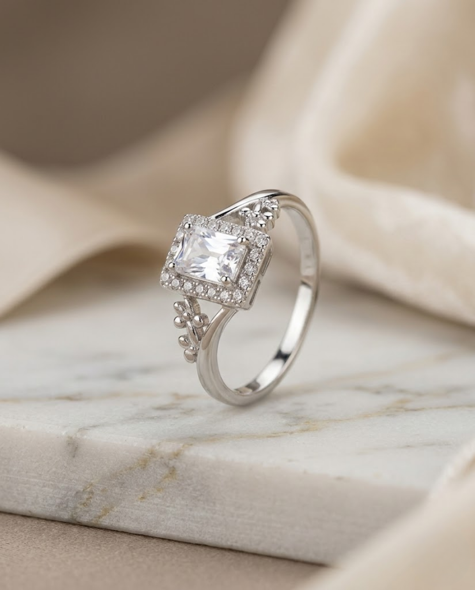 Orneza Emerald Cut Zirconia Halo Ring in Silver