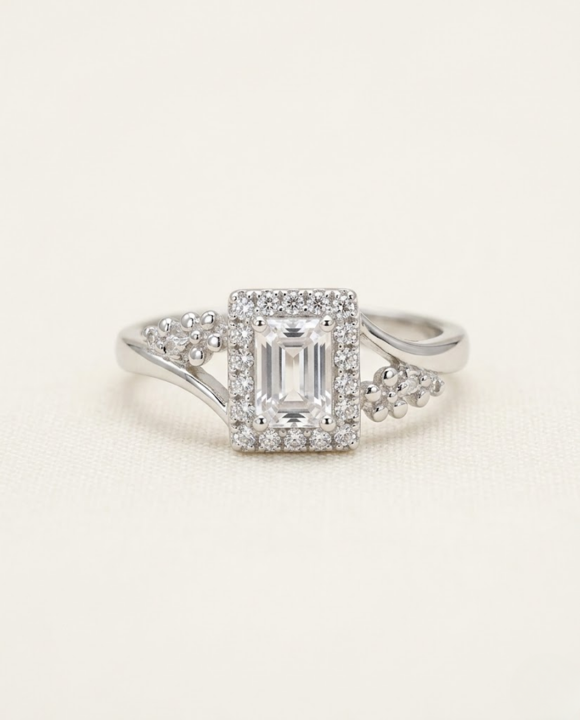 Orneza Emerald Cut Zirconia Halo Ring in Silver