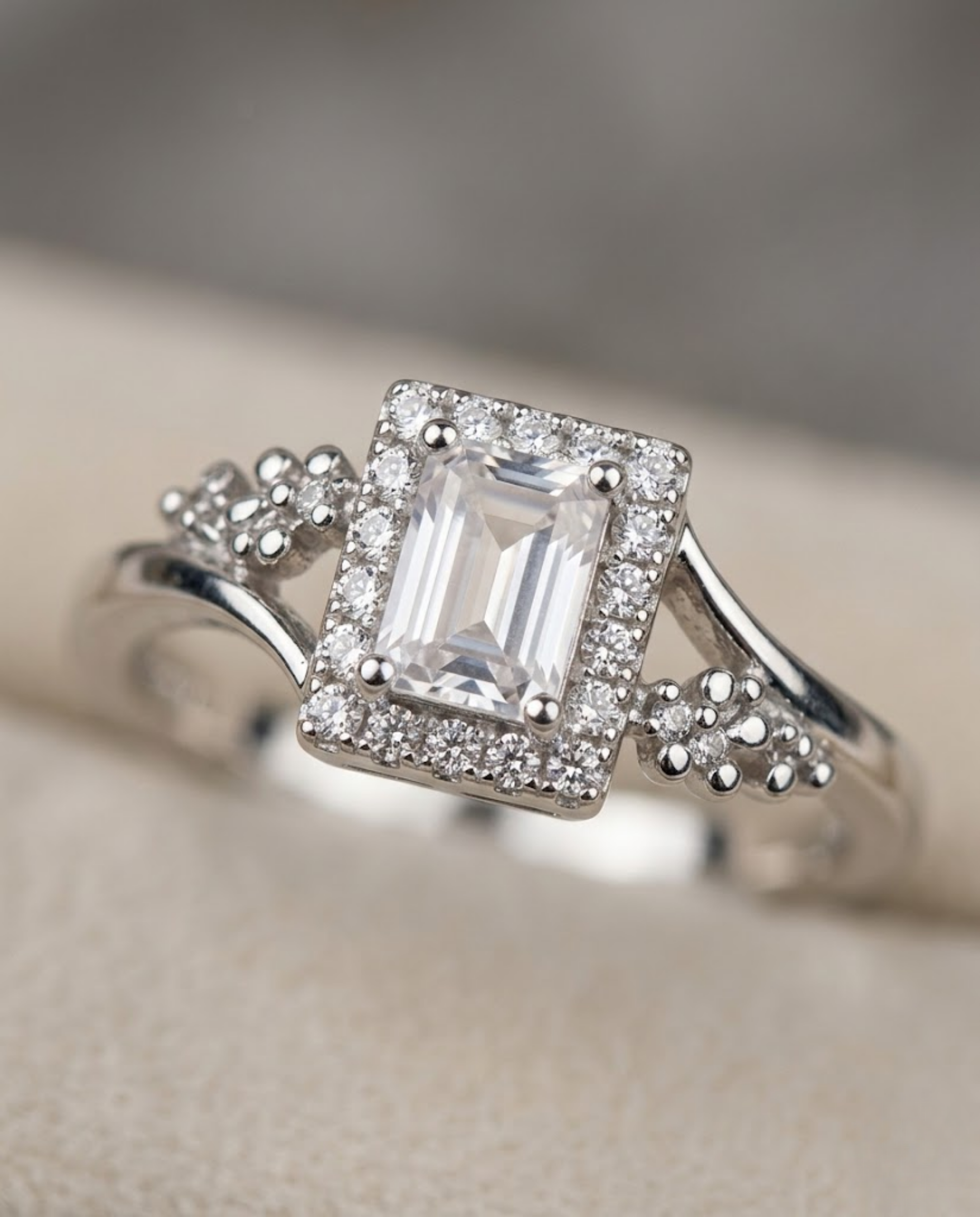 Orneza Emerald Cut Zirconia Halo Ring in Silver