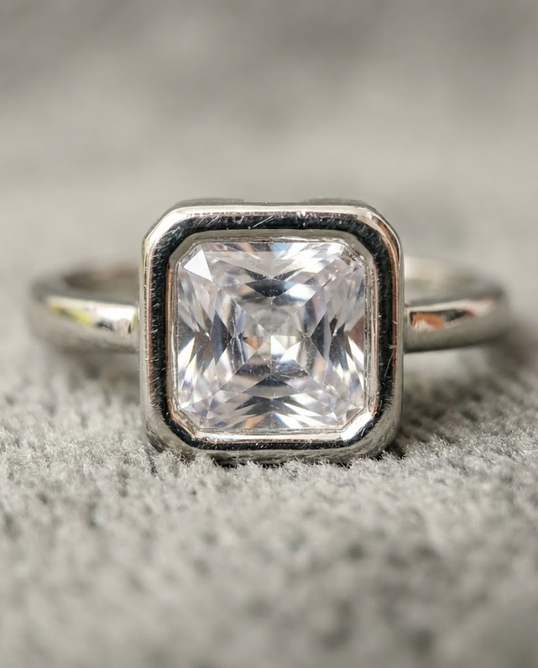 Orneza Princess Cut Bezel Set Sterling Silver Ring