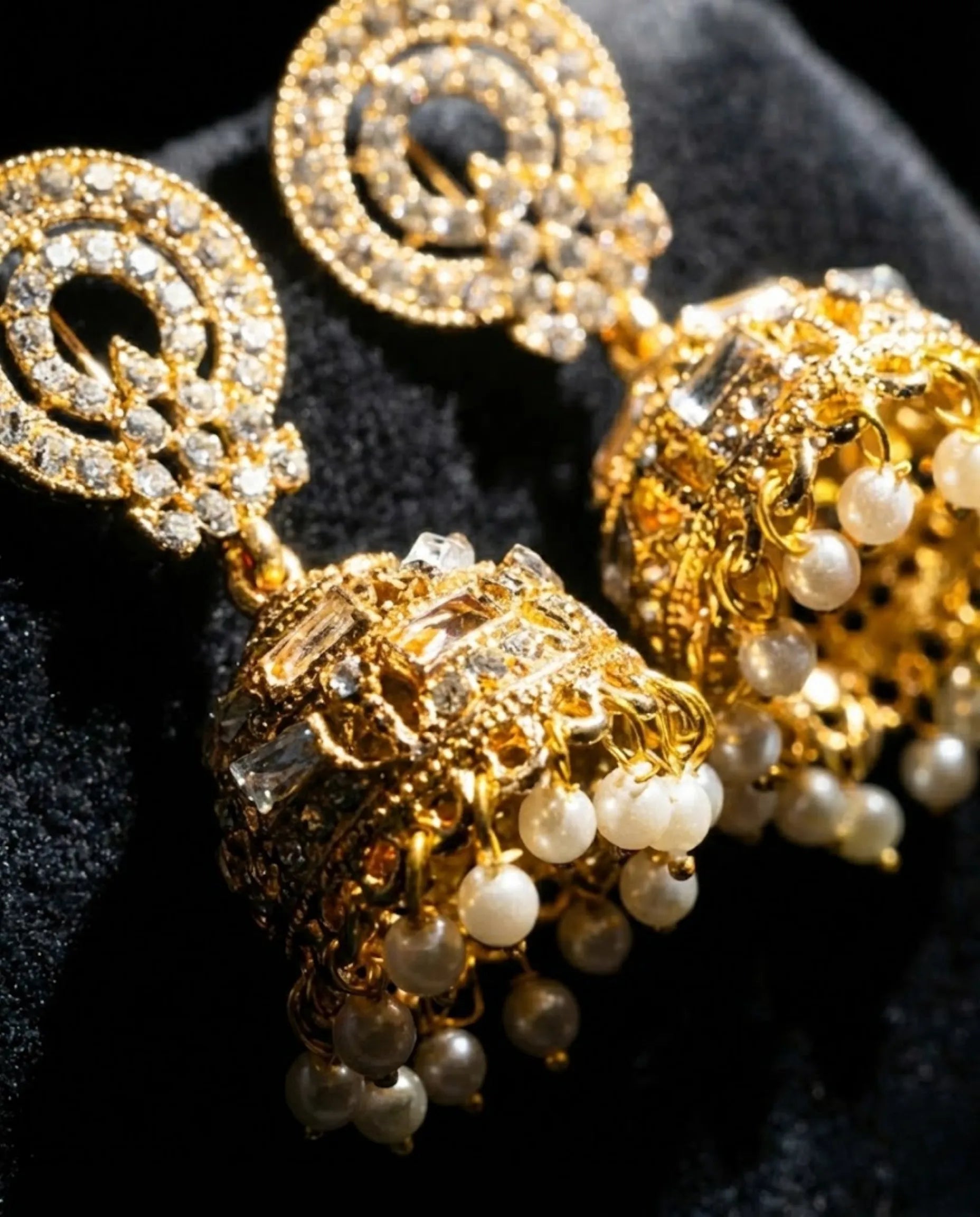Orneza Gold Zircon Studded Jhumka Earrings with Pearls