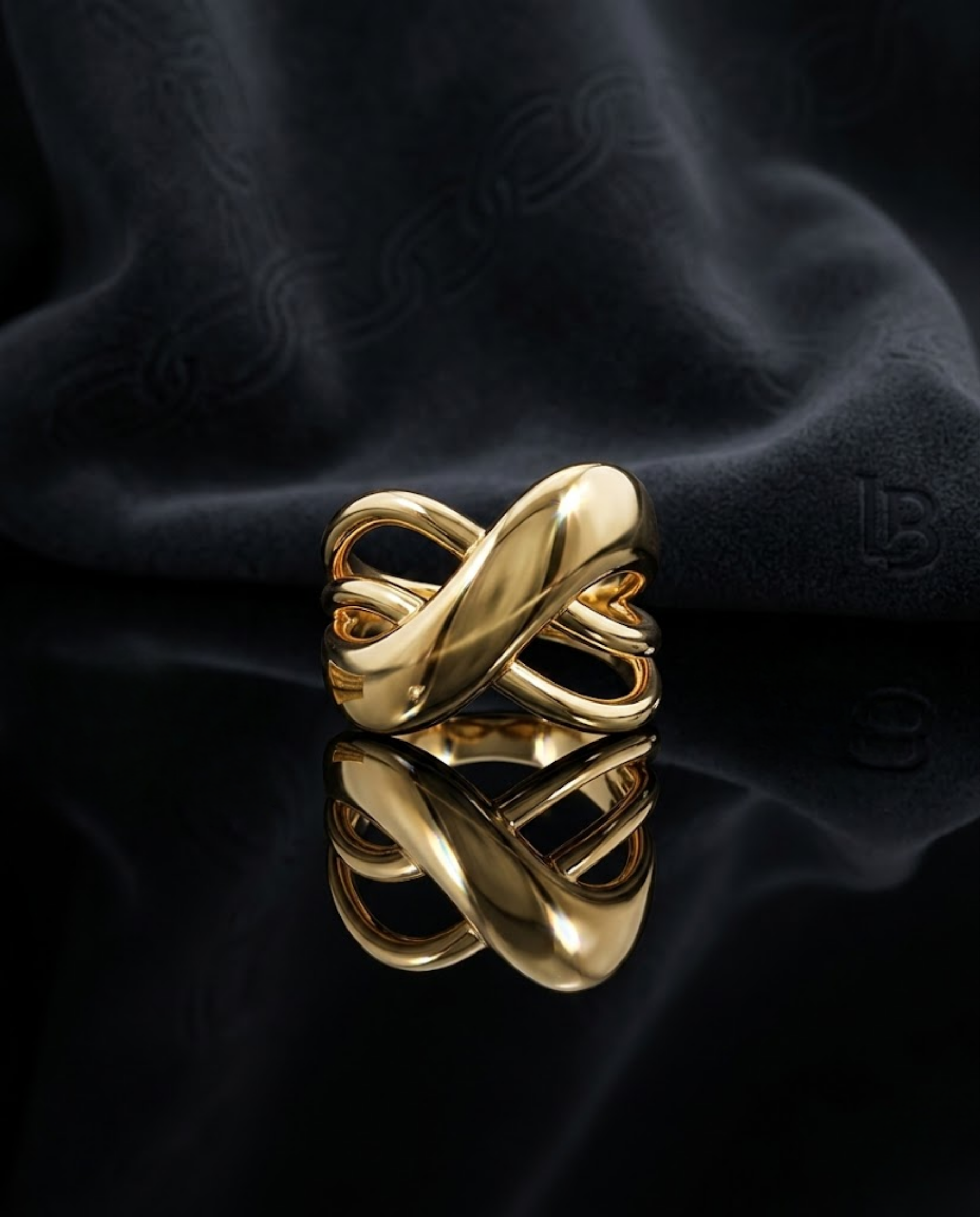 Orneza Infinite Ribbon Gold Plated Statement Ring
