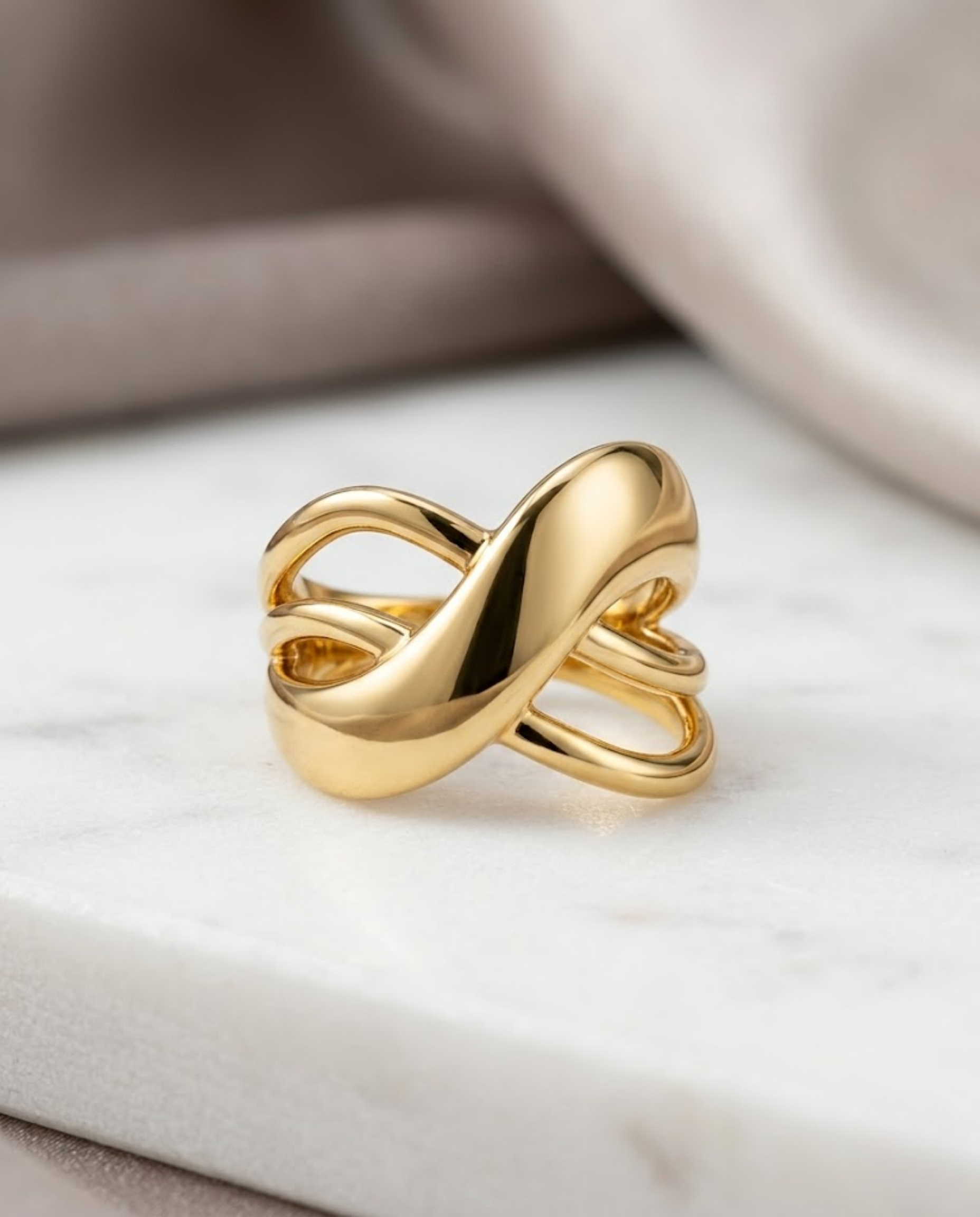 Orneza Infinite Ribbon Gold Plated Statement Ring